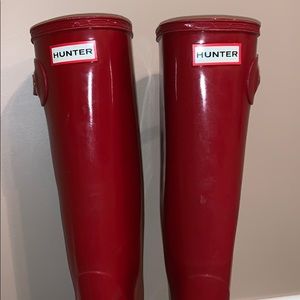 tall red glossy hunter rainboots, worn once